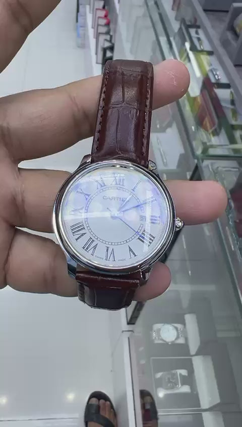 NEW EXCLUSIVE CARTIER WATCH WITH LEATHER STRAP WITH CLASP LOCK VERY IMPRESSIVE NOW ALLOVER IN OMAN || CARTIER LS 1777991
